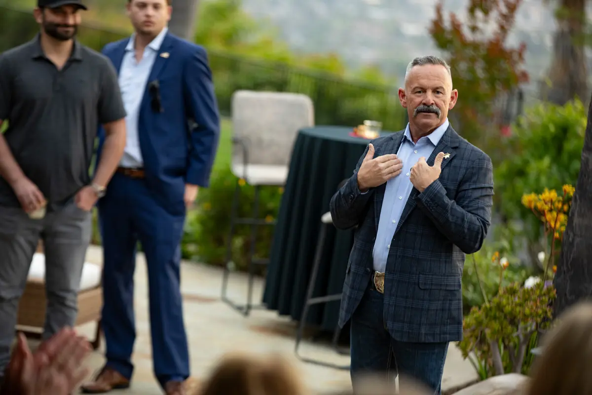 Sheriff Chad Bianco speaking to supporters at an outdoor event